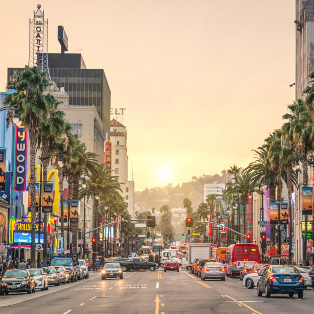 Los Angeles, United States - December 18, 2013: View of Hollywood Boulevard at sunset. In 1958, the Walk of Fame was created on this street as a tribute to artists working in the entertainment industry.
